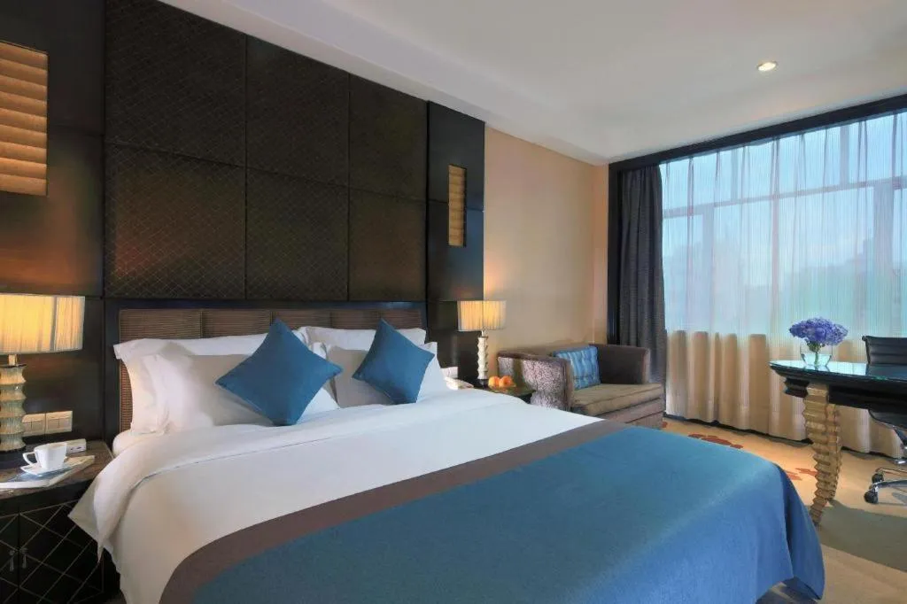 Bed in Dongguan Silver World Garden Hotel
