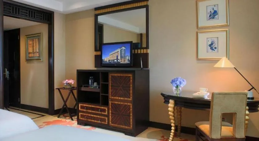 Bed in Dongguan Silver World Garden Hotel