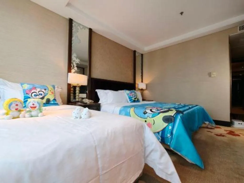 Bed in Dongguan Silver World Garden Hotel