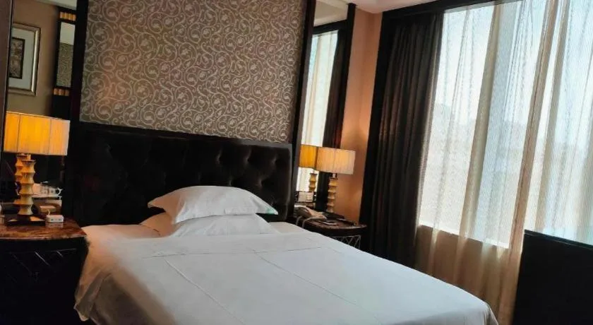 Bed in Dongguan Silver World Garden Hotel