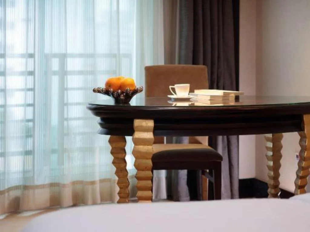 Bed in Dongguan Silver World Garden Hotel