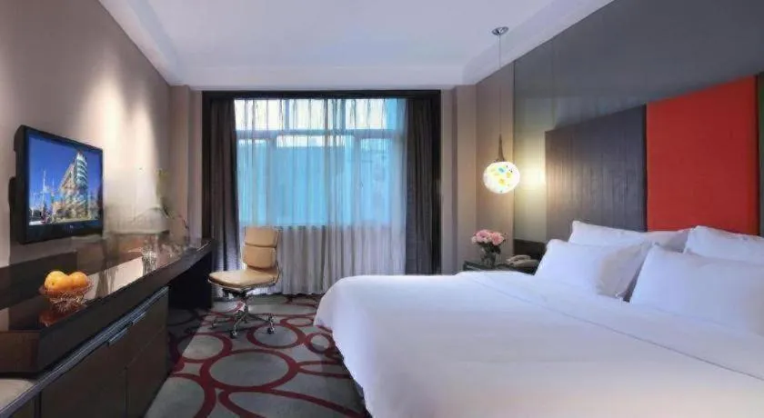 Bed in Dongguan Silver World Garden Hotel