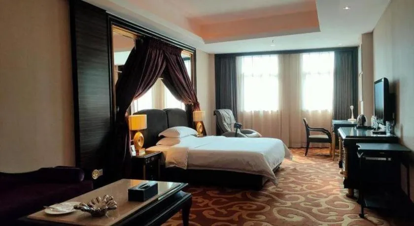 Bed in Dongguan Silver World Garden Hotel