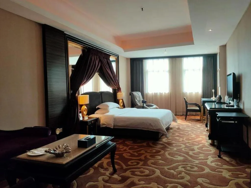 Bed in Dongguan Silver World Garden Hotel