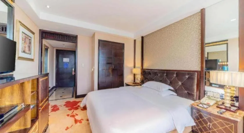 Bed in Dongguan Silver World Garden Hotel