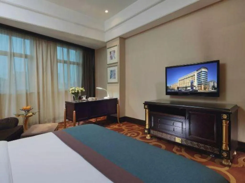 Bed in Dongguan Silver World Garden Hotel