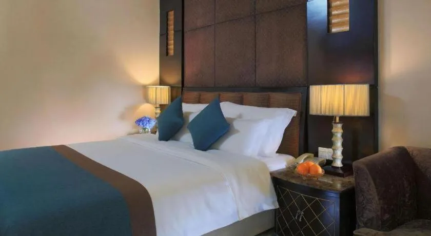 Bed in Dongguan Silver World Garden Hotel