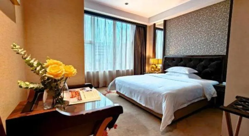 Bed in Dongguan Silver World Garden Hotel