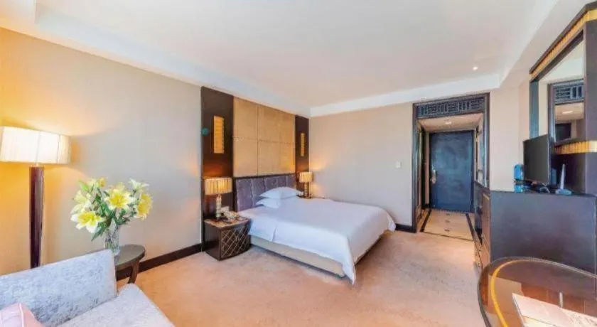 Bed in Dongguan Silver World Garden Hotel