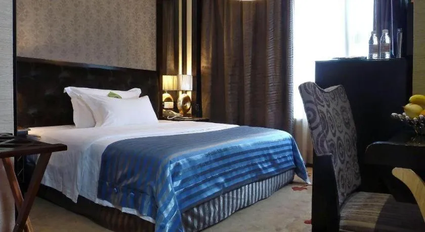 Bed in Dongguan Silver World Garden Hotel