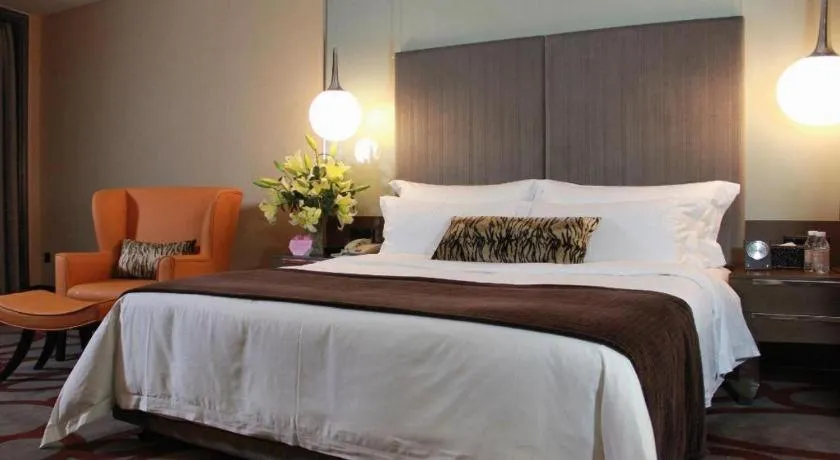 Bed in Dongguan Silver World Garden Hotel