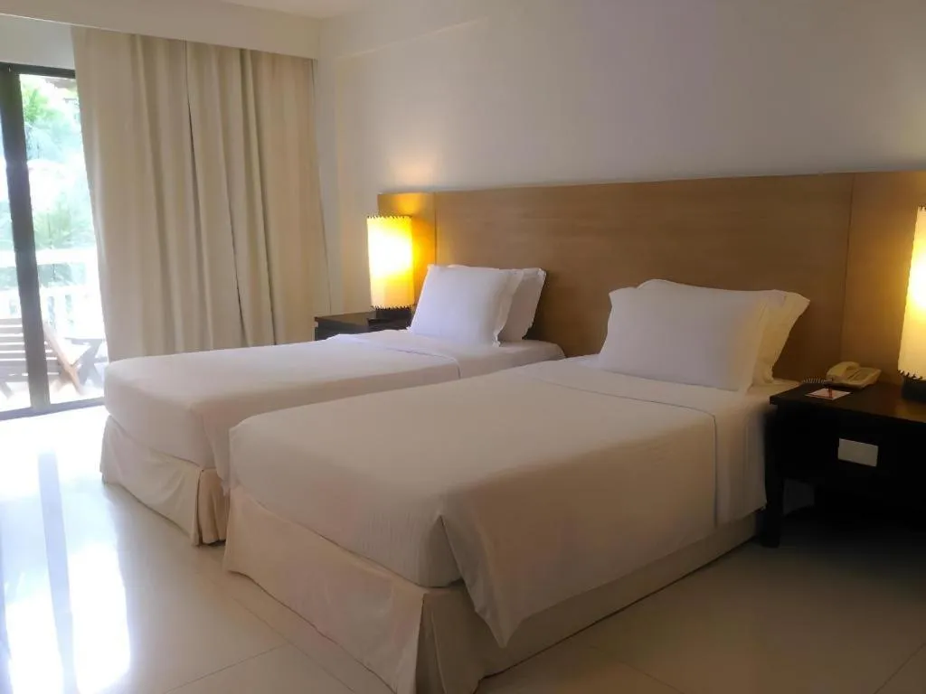 Bed in Ramada by Wyndham Phuket Southsea