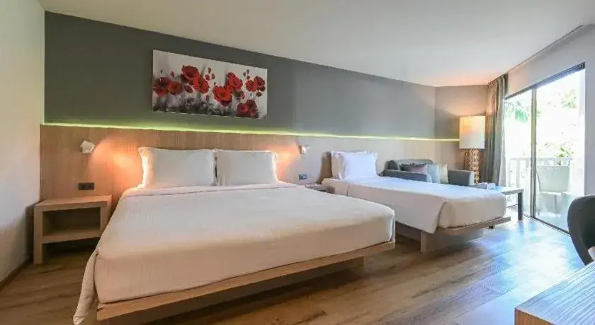 Bed in Ramada by Wyndham Phuket Southsea Bed in Ramada by Wyndham Phuket Southsea