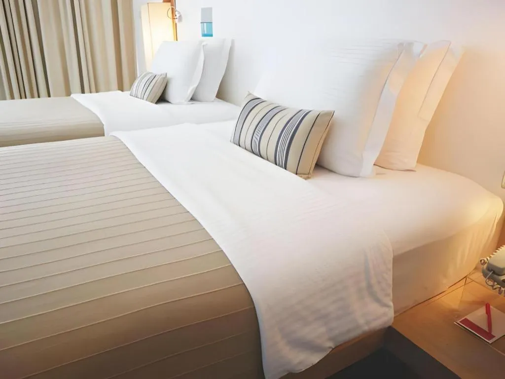 Bed in Ramada by Wyndham Phuket Southsea