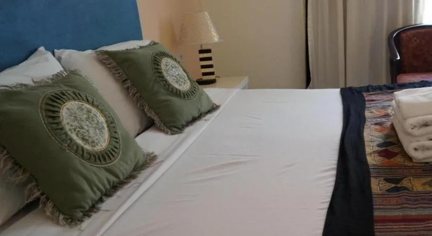 Bed in Seng Aroun Hotel