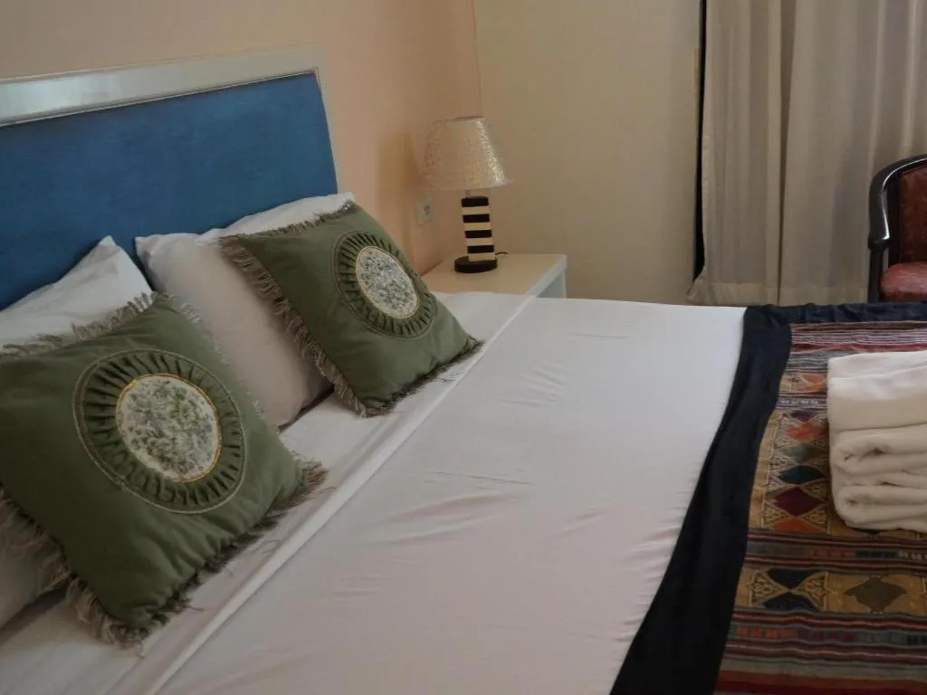 Bed in Seng Aroun Hotel