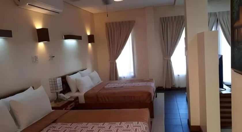 Bed in Kahuna Beach Resort and Spa