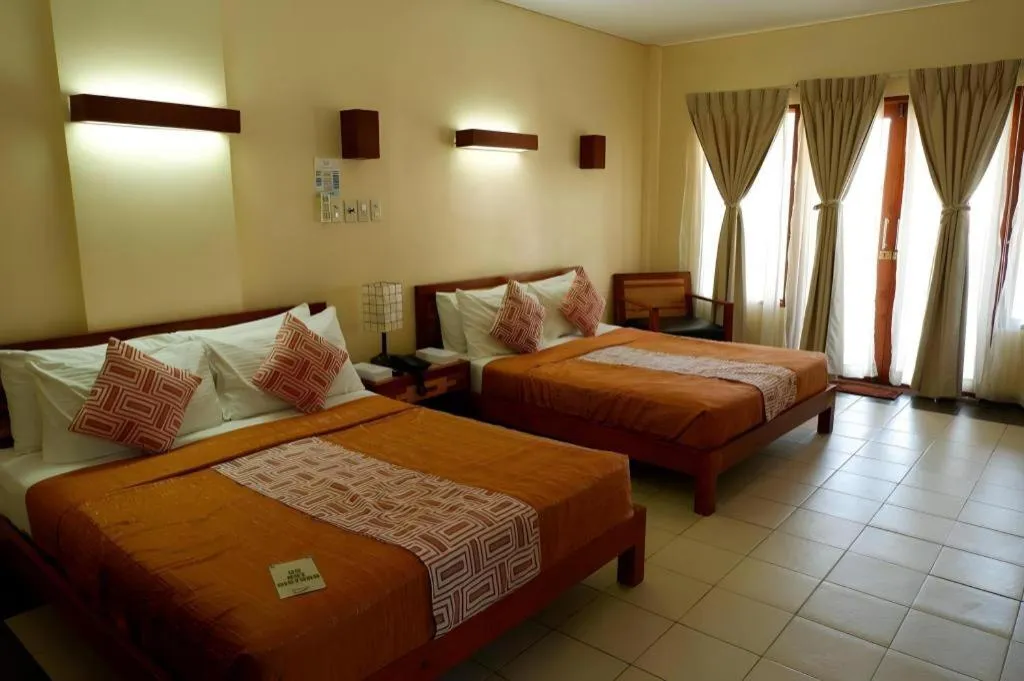 Bed in Kahuna Beach Resort and Spa