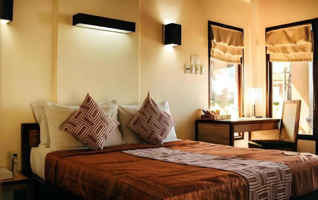 Bed in Kahuna Beach Resort and Spa