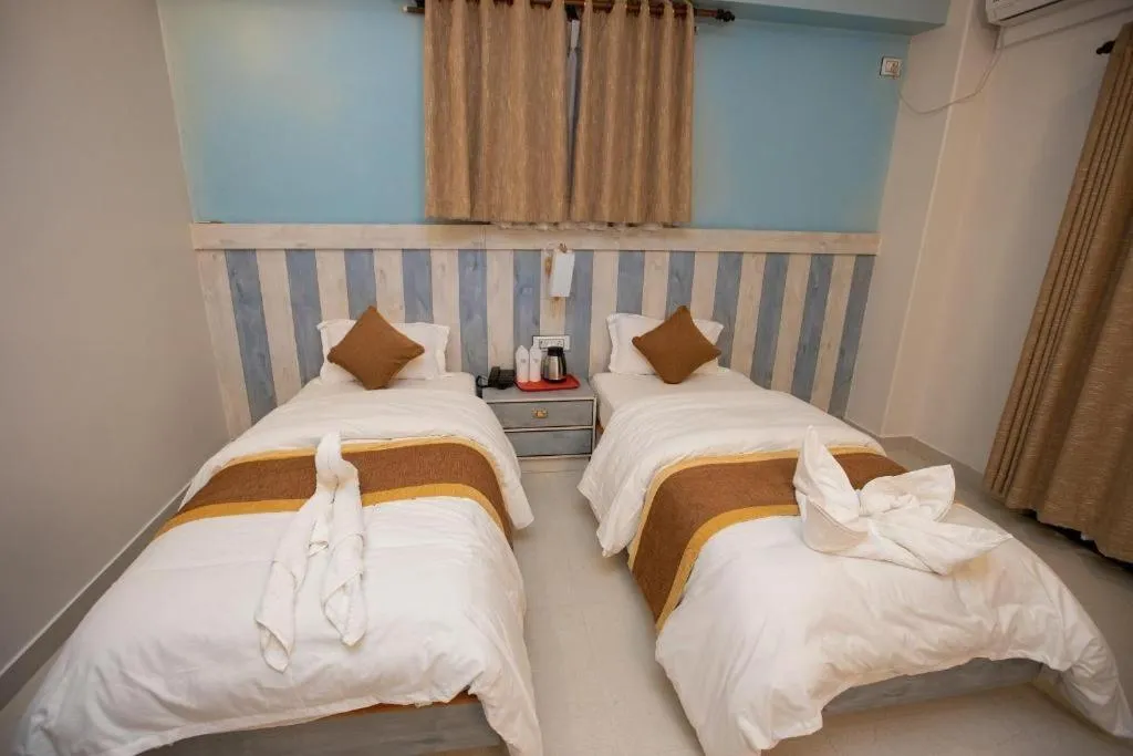 Bed in Hotel Visitors Inn P. Ltd.