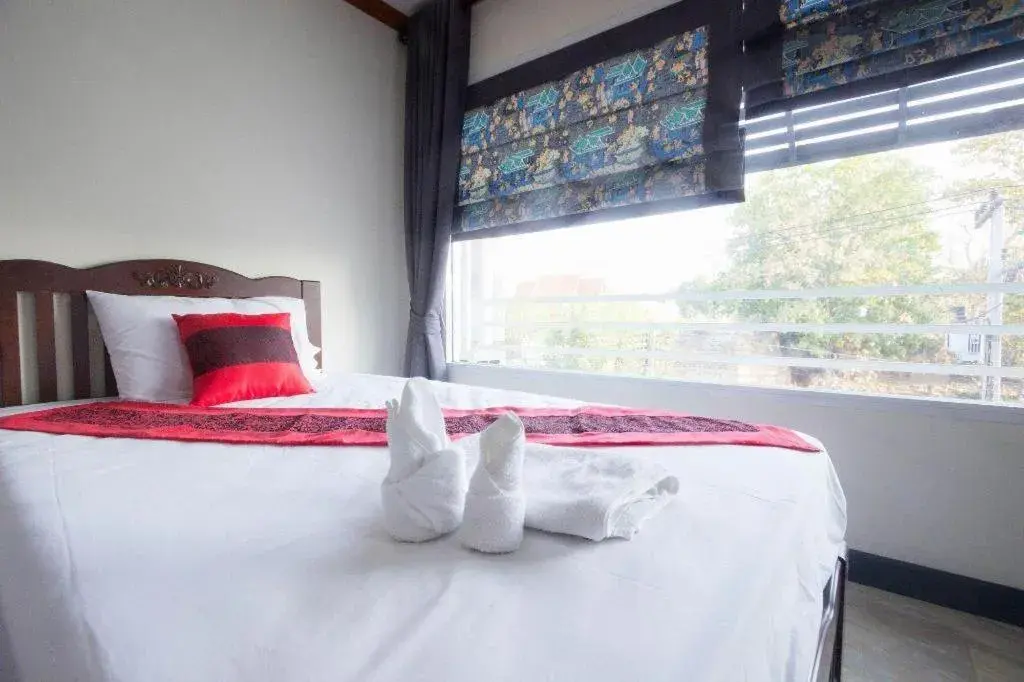 Bed in Sripoom Boutique House Bed in Sripoom Boutique House