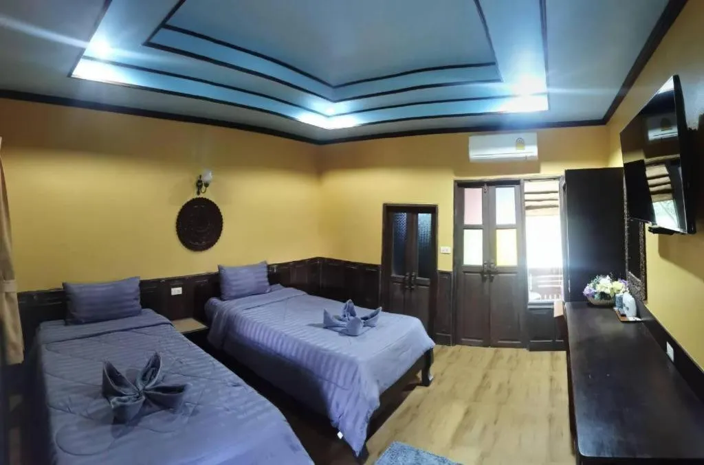 Bed in Wangnamkhao Resort