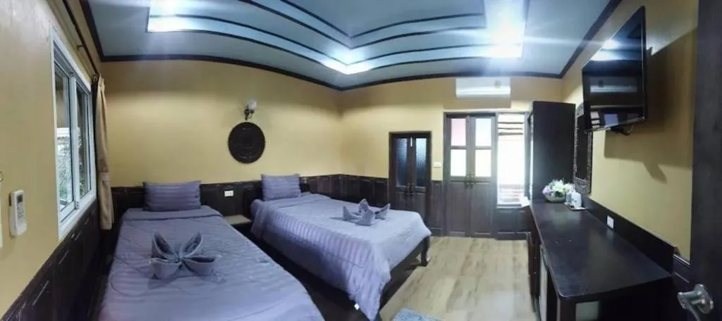 Bed in Wangnamkhao Resort