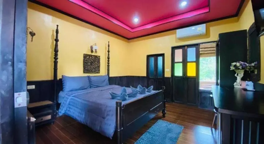 Bed in Wangnamkhao Resort