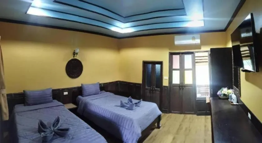 Bed in Wangnamkhao Resort