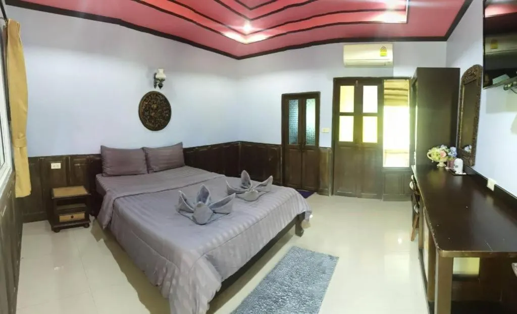 Bed in Wangnamkhao Resort