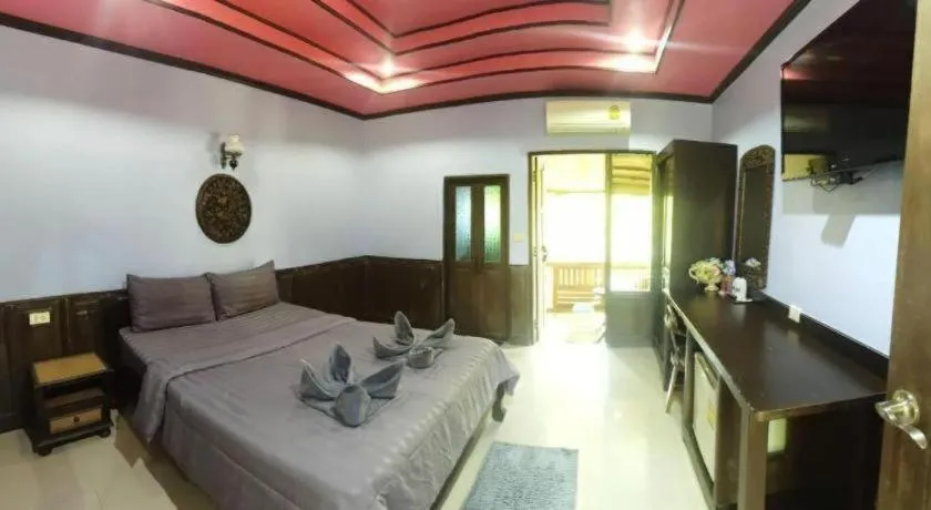 Bed in Wangnamkhao Resort