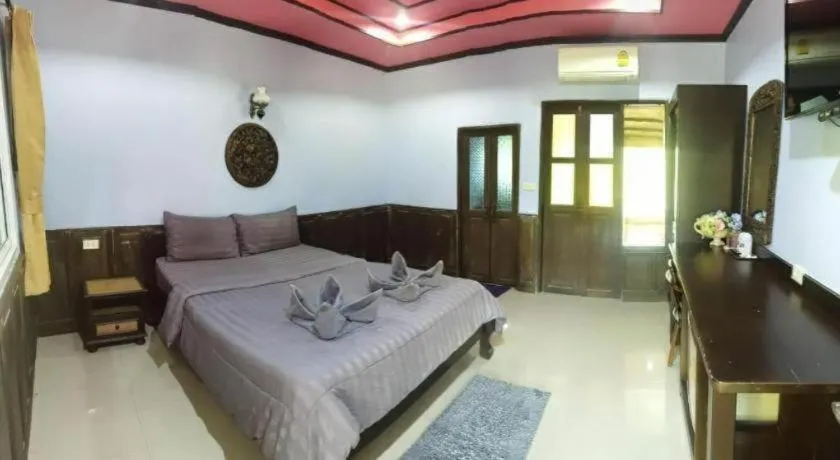 Bed in Wangnamkhao Resort