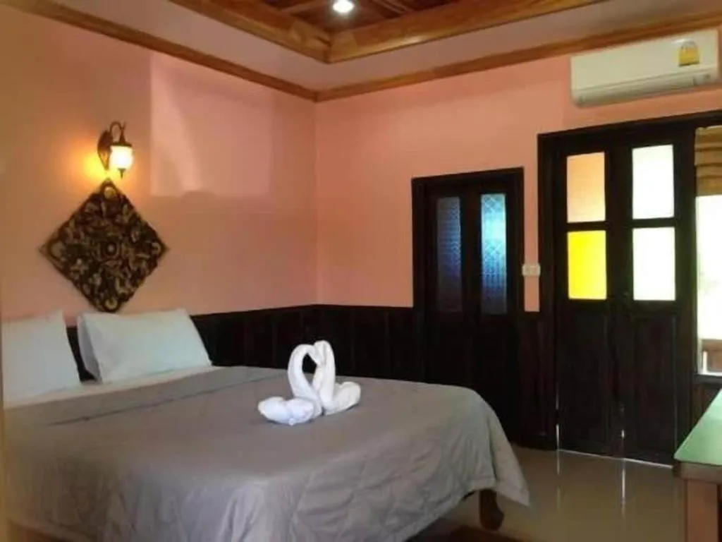 Bed in Wangnamkhao Resort