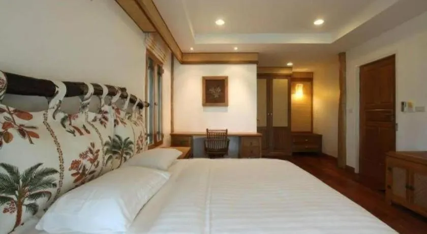 Bed in Chiangkham Luang Resort