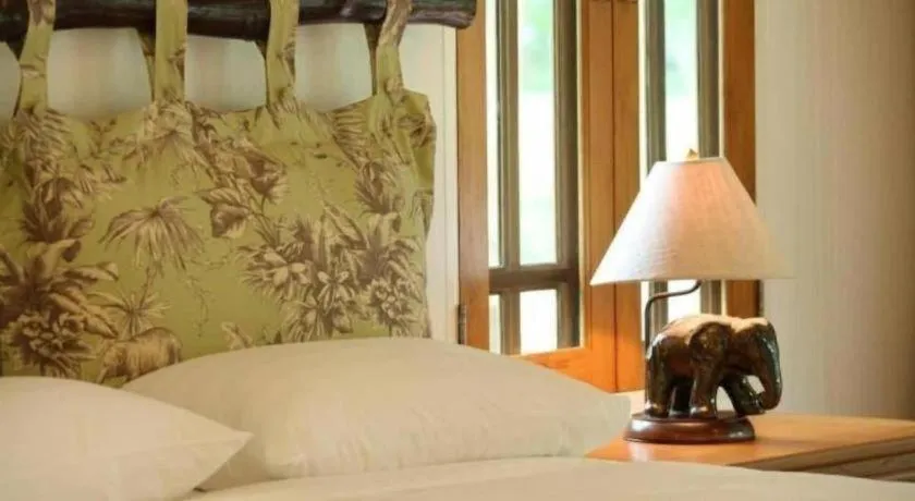 Bed in Chiangkham Luang Resort