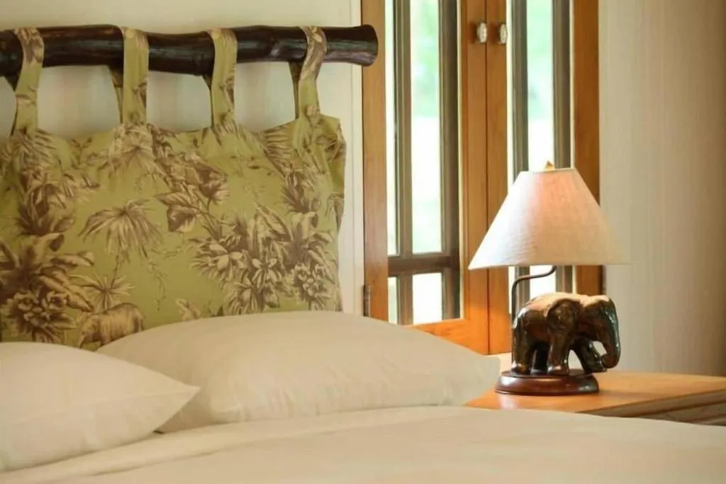 Bed in Chiangkham Luang Resort