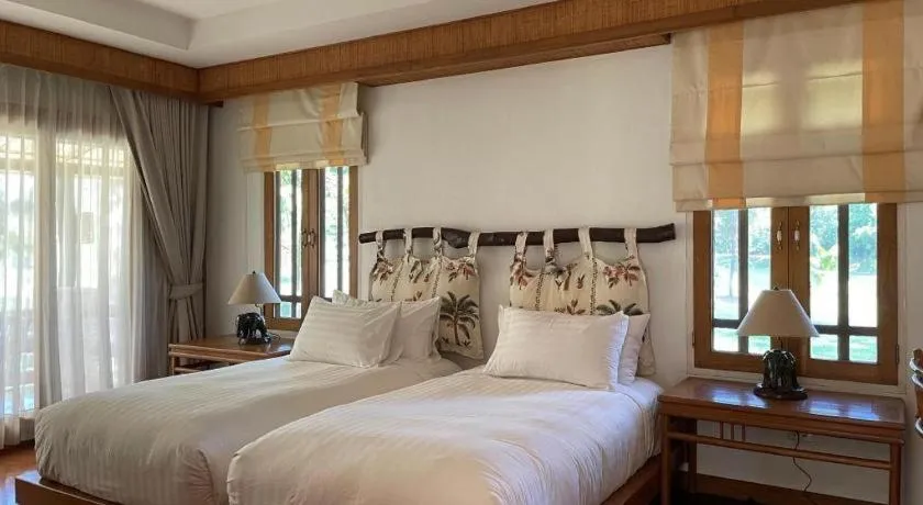 Bed in Chiangkham Luang Resort