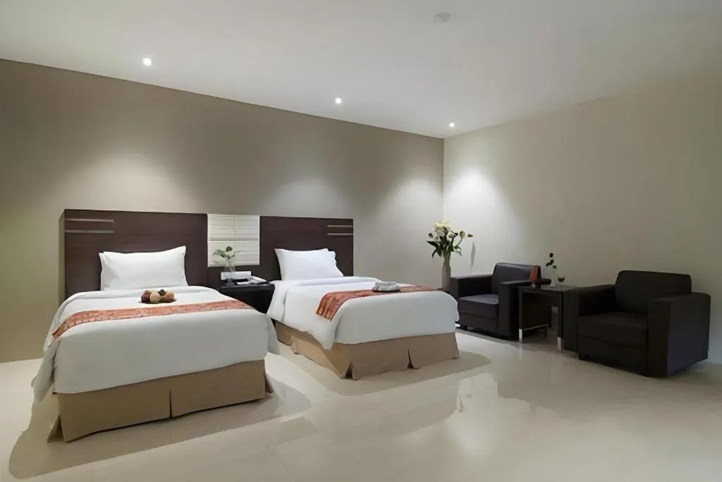 Bed in Aria Barito Hotel
