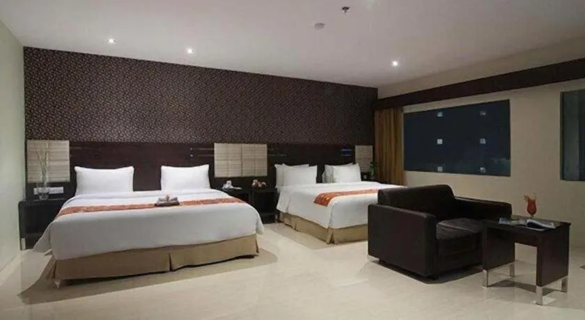 Bed in Aria Barito Hotel
