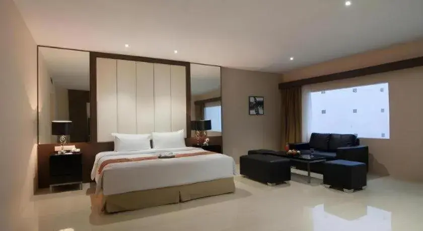 Bed in Aria Barito Hotel Bed in Aria Barito Hotel