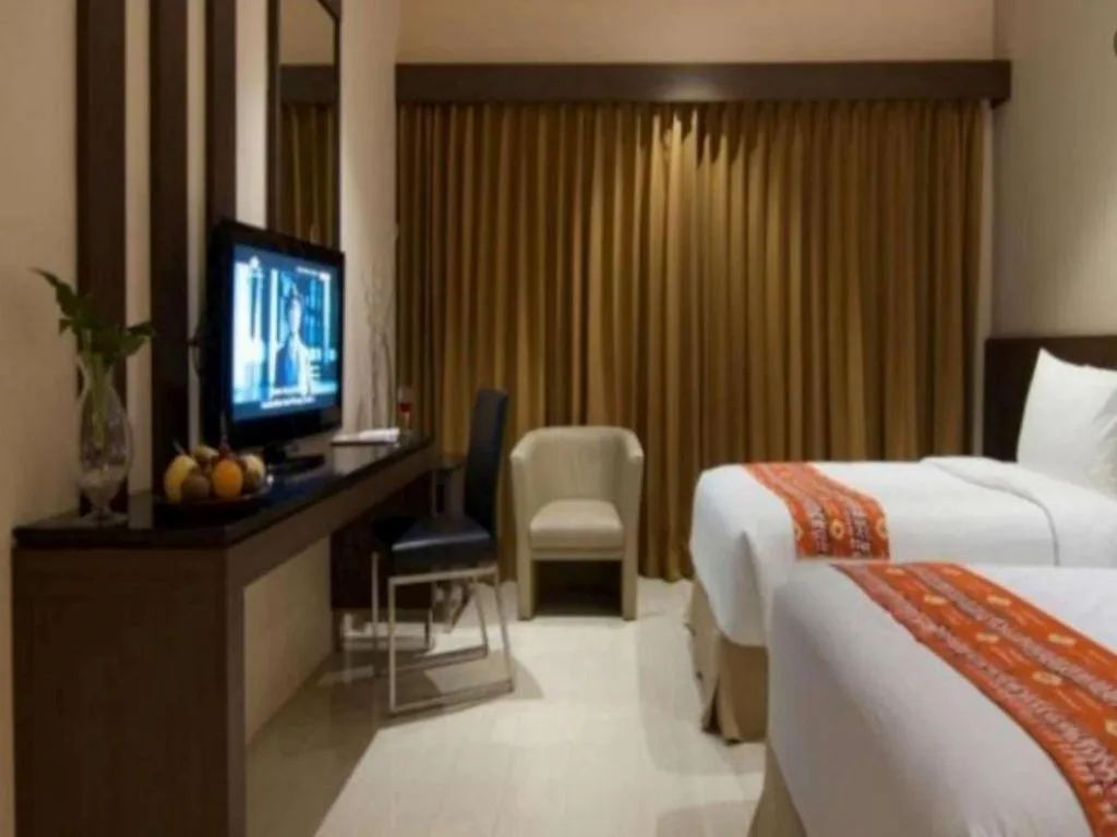 Bed in Aria Barito Hotel