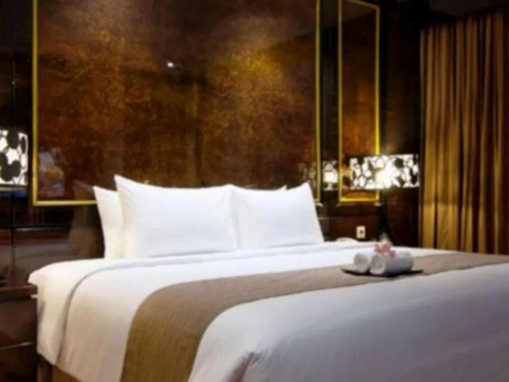 Bed in Aria Barito Hotel