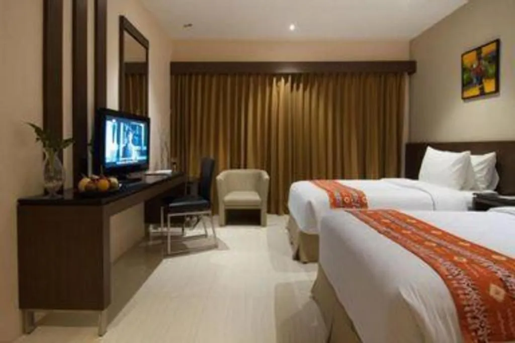 Bed in Aria Barito Hotel