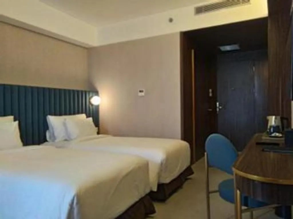 Bed in The Bono Hotel Pekanbaru