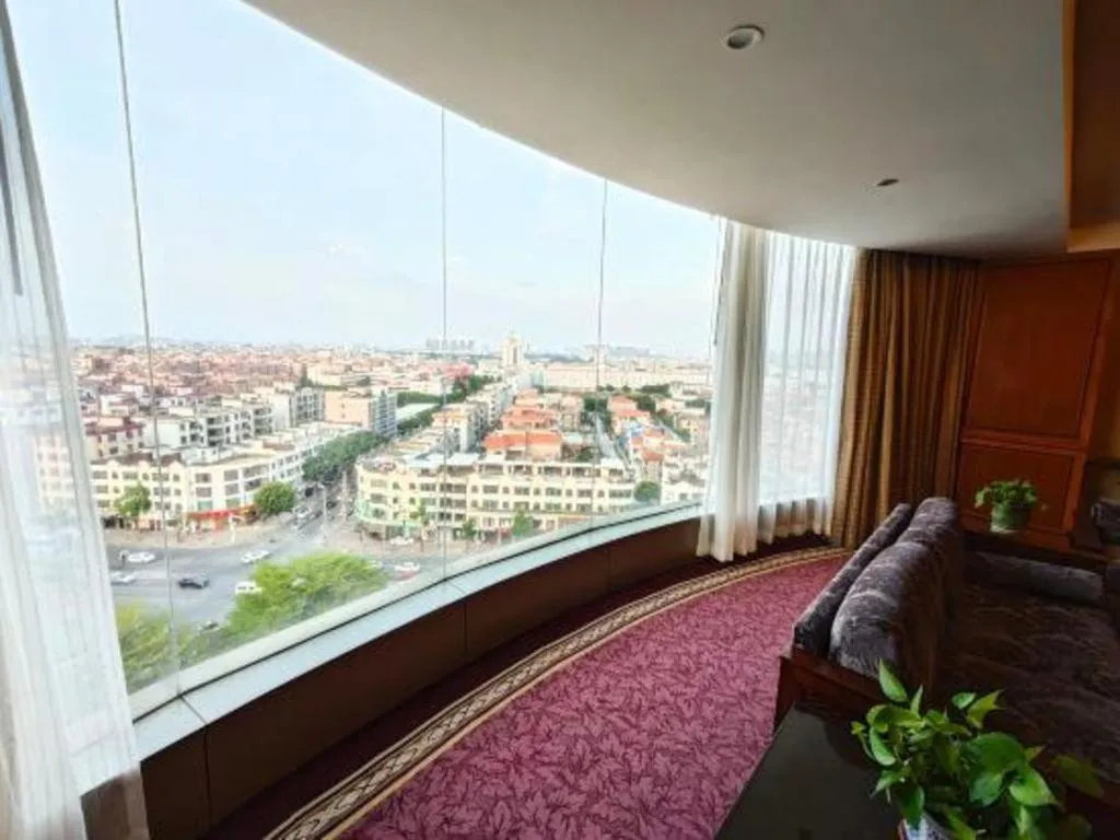 Bed in Chinflux Mandarin Hotel