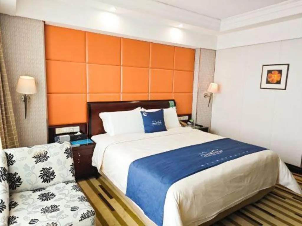 Bed in Chinflux Mandarin Hotel