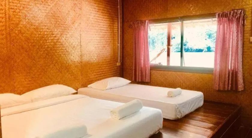 Bed in Tayan Resort Kanchanaburi