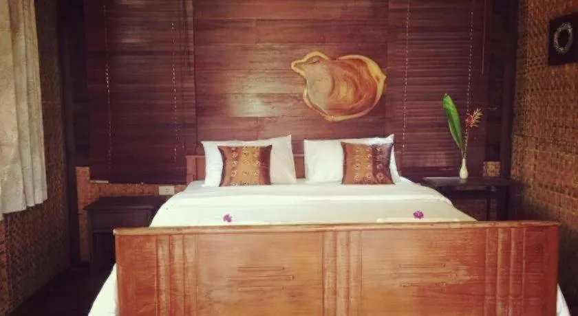 Bed in Tayan Resort Kanchanaburi