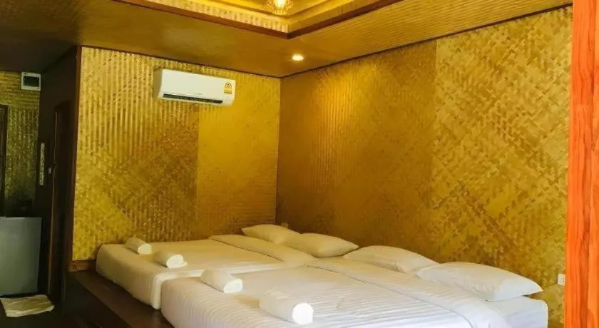 Bed in Tayan Resort Kanchanaburi