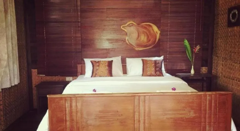 Bed in Tayan Resort Kanchanaburi